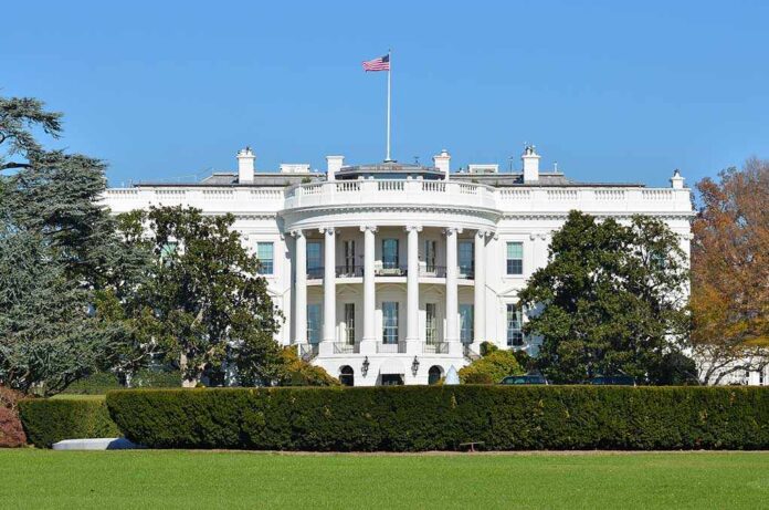 The White House with the American flag flying in front