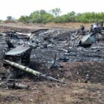 Warzone PR Stunt Ends In Carnage Airplane crash debris scattered across a burned field
