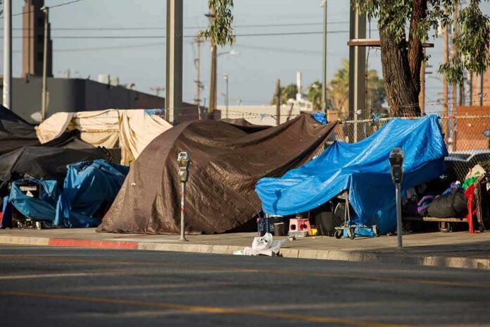 shutterstock_1495413719 Street tents covered with tarps along a sidewalk