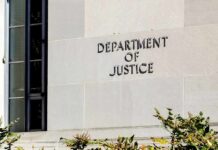 Hormone Shots On Sidewalk Stun NYU Department of Justice building exterior wall