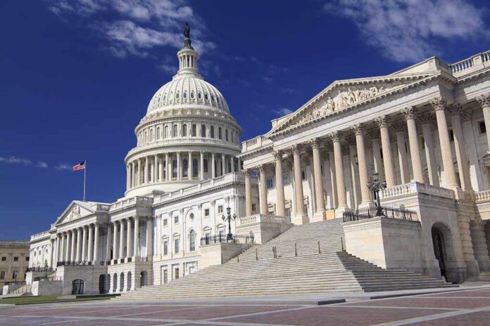 The U.S. Capitol building with its dome and columns under a blue sky