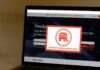 Laptop screen showing a political committee website with a popup featuring an elephant logo