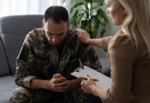 New Hope Emerges After PTSD Drug Drought Soldier in camouflage receives support from a counselor