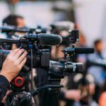 Musk’s Wheel-Less Gamble Hits Streets Video cameras on tripods at a media event