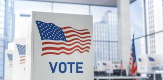 Voting booth with American flag design in a modern polling place