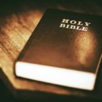 Holy Bible on a wooden table