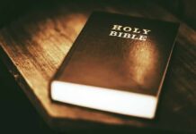 Holy Bible on a wooden table