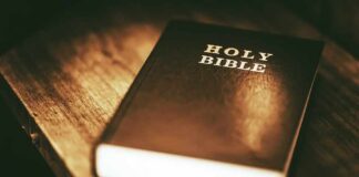 Holy Bible on a wooden table
