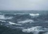 Rough ocean waves under a cloudy sky