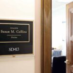 Senator SLAMS Democratic Rival Over Ugly Reddit Past! Office door sign in a hallway