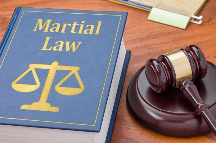 Law book with scales symbol beside a judge's gavel on a desk