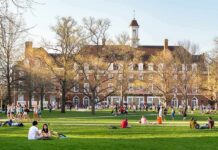 Beijing Playbook Exposed on U.S. Campuses Students relaxing on a campus quad in front of a brick academic building