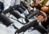 Cartel Cash Hooks High Schoolers Handguns on display at a store counter