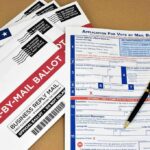 Vote-by-mail ballot envelopes and application form with pen