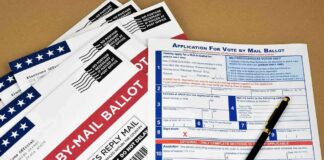 Vote-by-mail ballot envelopes and application form with pen