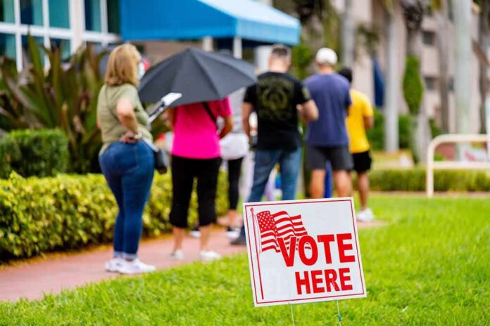 voters standing in line outside a polling place