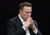 Pentagon Power Move: Musk In Elon Musk seated with hands steepled in thought