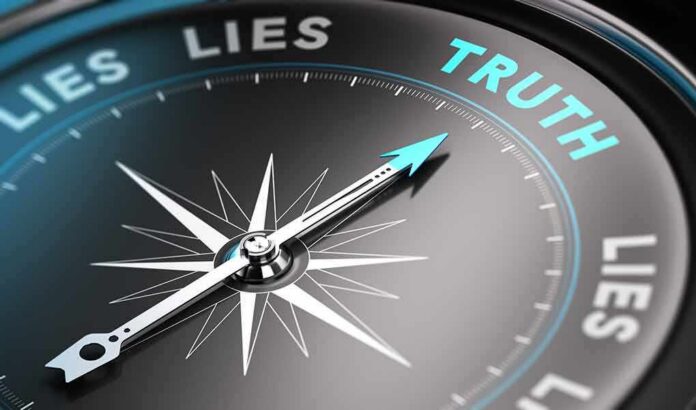 shutterstock_249410014 Compass needle pointing toward truth